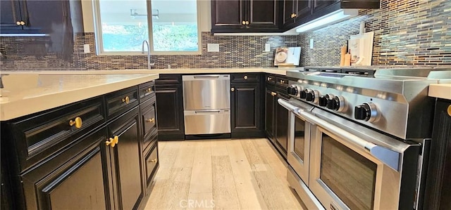 29310 Paseo Palmar, San Juan Capistrano, CA 92675 - kitchen featuring appliances with stainless steel finishes, light wood-style floors, light countertops, and tasteful backsplash
