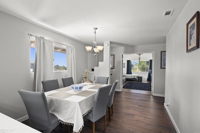 22432245 S Lanoitan, National City, CA 91950 - dining space featuring a chandelier, baseboards, and dark wood-style flooring