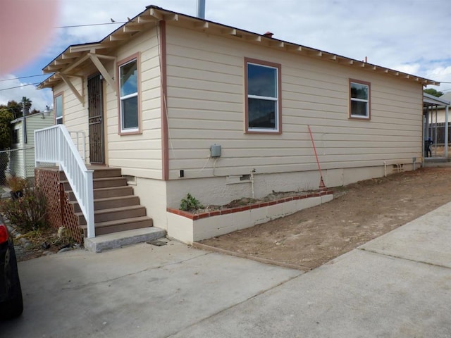22432245 S Lanoitan, National City, CA 91950 - view of home's exterior featuring crawl space and a patio