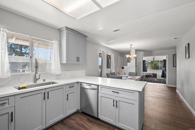 22432245 S Lanoitan, National City, CA 91950 - kitchen with stainless steel dishwasher, a peninsula, gray cabinetry, a sink, and a chandelier