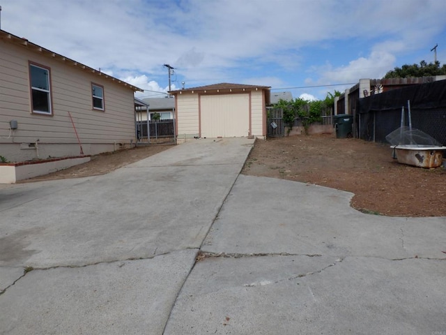 22432245 S Lanoitan, National City, CA 91950 - view of yard with driveway and an outbuilding