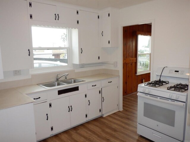 22432245 S Lanoitan, National City, CA 91950 - kitchen featuring gas range gas stove, a sink, healthy amount of natural light, and white cabinetry