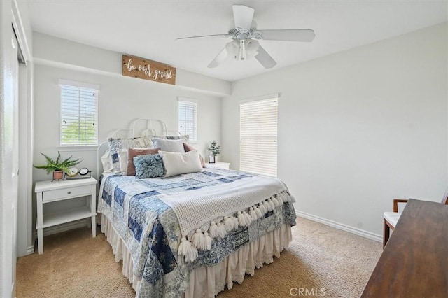 19728 Ellis Henry Ct, Newhall, CA 91321 - bedroom with light carpet, baseboards, and ceiling fan