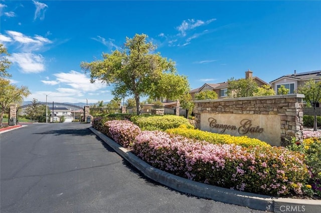 19728 Ellis Henry Ct, Newhall, CA 91321 - community sign with a gate