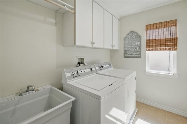 19728 Ellis Henry Ct, Newhall, CA 91321 - laundry area with washer and clothes dryer, baseboards, and cabinet space
