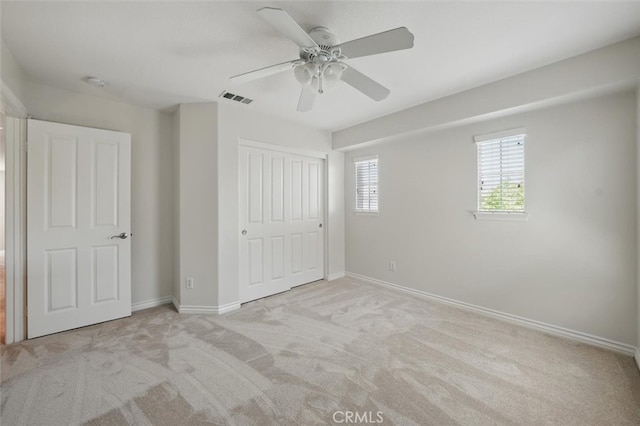 19728 Ellis Henry Ct, Newhall, CA 91321 - unfurnished bedroom featuring carpet, baseboards, a closet, and a ceiling fan