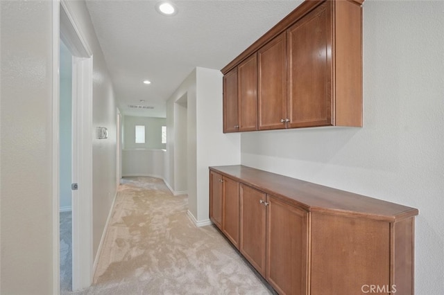 19728 Ellis Henry Ct, Newhall, CA 91321 - hall with light carpet, baseboards, and recessed lighting