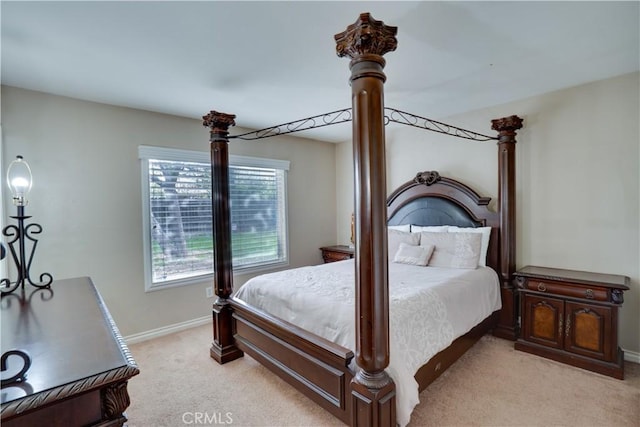 12076 Racket Ct, Moreno Valley, CA 92557 - bedroom with light carpet and baseboards