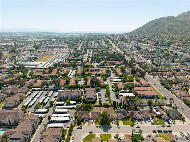 12076 Racket Ct, Moreno Valley, CA 92557 - aerial view of property and surrounding area with mountains and nearby suburban area