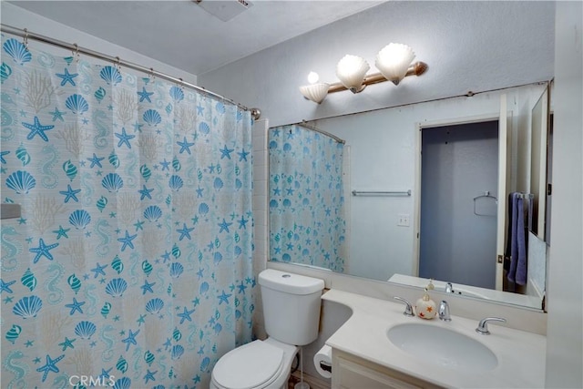 12076 Racket Ct, Moreno Valley, CA 92557 - bathroom with toilet, vanity, and a shower with shower curtain