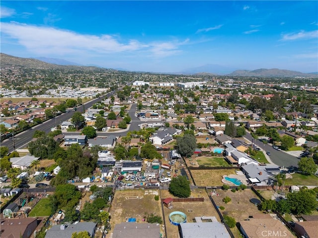 12076 Racket Ct, Moreno Valley, CA 92557 - aerial view of property's location with mountains and nearby suburban area