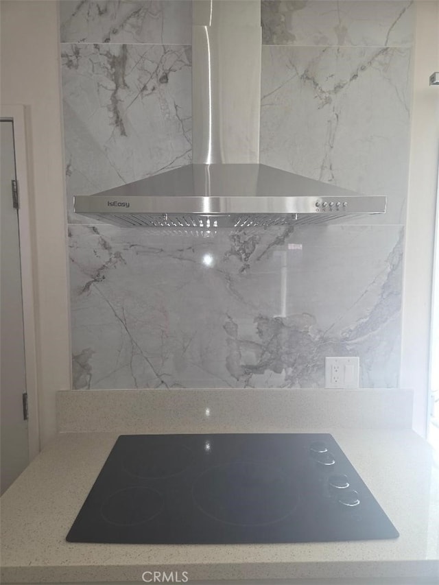 1512 Forane, Barstow, CA 92311 - kitchen view of wall chimney exhaust hood and black electric stovetop