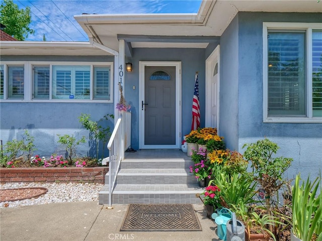 401 E Cherry Ave, Monrovia, CA 91016 - doorway to property featuring stucco siding