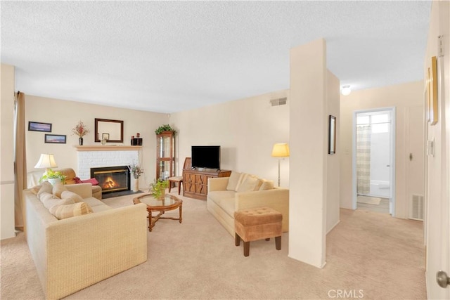 2006 W 180th Pl, Torrance, CA 90504 - living room featuring light carpet, a fireplace, and a textured ceiling