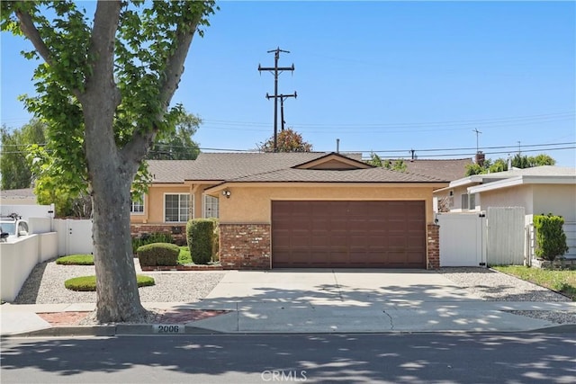 2006 W 180th Pl, Torrance, CA 90504 - ranch-style house featuring a gate, an attached garage, stucco siding, concrete driveway, and brick siding