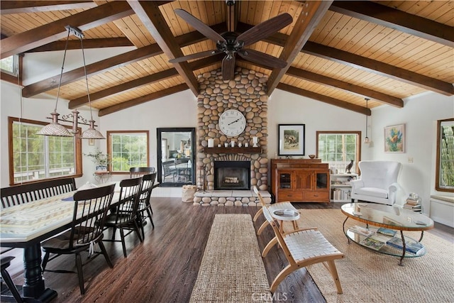 23328 Valley Circle Blvd, Chatsworth, CA 91311 - living area featuring wood ceiling with exposed beams, wood finished floors, plenty of natural light, a stone fireplace, and ceiling fan