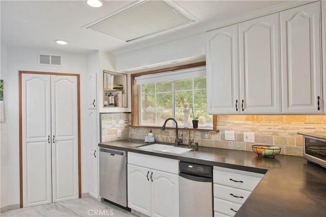 23328 Valley Circle Blvd, Chatsworth, CA 91311 - kitchen featuring stainless steel dishwasher, a sink, dark countertops, white cabinetry, and recessed lighting
