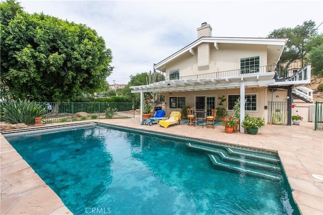 23328 Valley Circle Blvd, Chatsworth, CA 91311 - back of property featuring a pergola, a patio area, and a chimney