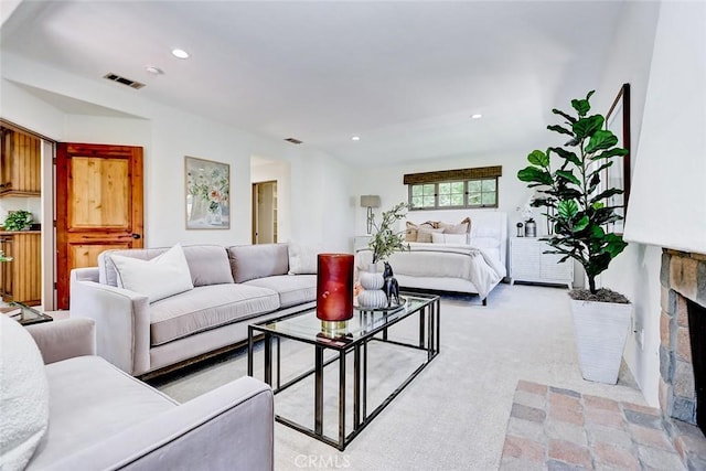 2917 N Poinsettia Ave, Manhattan Beach, CA 90266 - living room featuring recessed lighting, a fireplace with raised hearth, and light carpet
