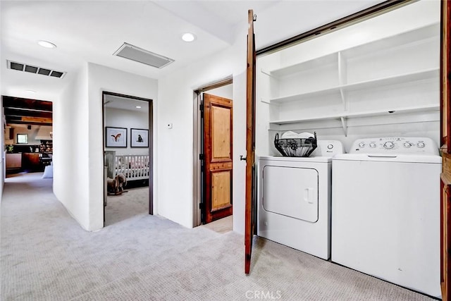 2917 N Poinsettia Ave, Manhattan Beach, CA 90266 - laundry area with independent washer and dryer, light colored carpet, and recessed lighting