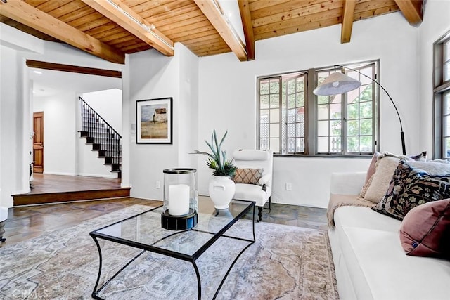 2917 N Poinsettia Ave, Manhattan Beach, CA 90266 - living area featuring plenty of natural light, wooden ceiling with exposed beams, stairs, and stone finish flooring