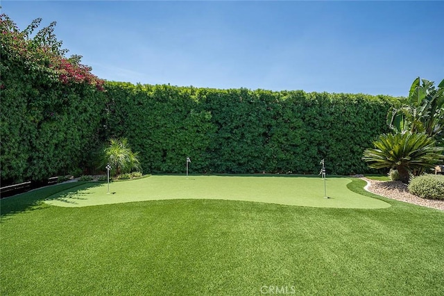 1459 W Quince Ct, Ontario, CA 91762 - fenced backyard featuring a putting green