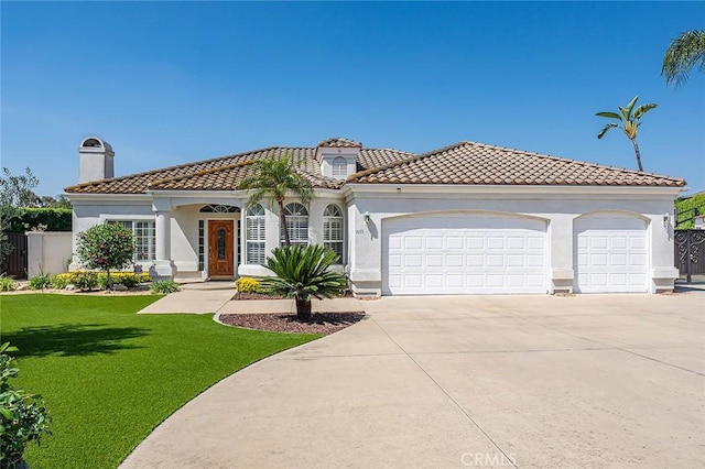 1459 W Quince Ct, Ontario, CA 91762 - mediterranean / spanish home featuring a garage, driveway, a chimney, a front yard, and a tiled roof