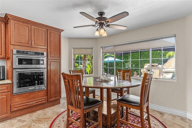 1459 W Quince Ct, Ontario, CA 91762 - dining room featuring baseboards and ceiling fan