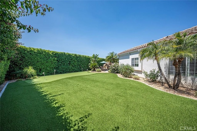 1459 W Quince Ct, Ontario, CA 91762 - view of grassy yard featuring an area to practice putting