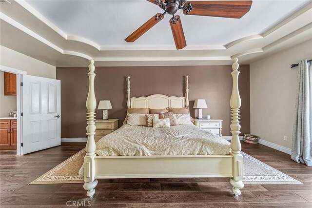1459 W Quince Ct, Ontario, CA 91762 - bedroom with a raised ceiling, dark wood-style flooring, and baseboards
