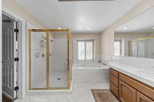 1459 W Quince Ct, Ontario, CA 91762 - full bathroom with a garden tub, a shower stall, tile patterned flooring, vanity, and recessed lighting