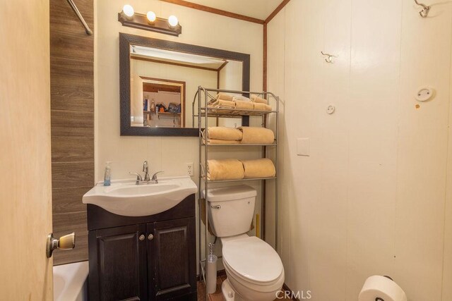 43387 Sheephorn Rd, Big Bear Lake, CA 92315 - full bathroom featuring vanity, toilet, and crown molding