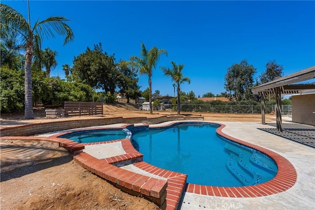 16481 Valle Vista Way, Riverside, CA 92506 - view of pool with a patio area and a pool with connected hot tub