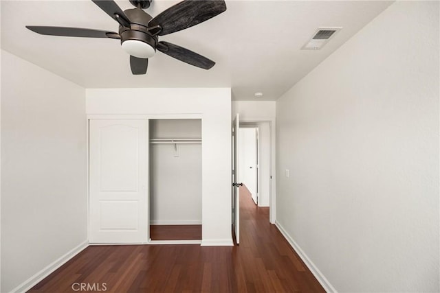 16481 Valle Vista Way, Riverside, CA 92506 - unfurnished bedroom featuring wood finished floors, baseboards, a closet, and a ceiling fan
