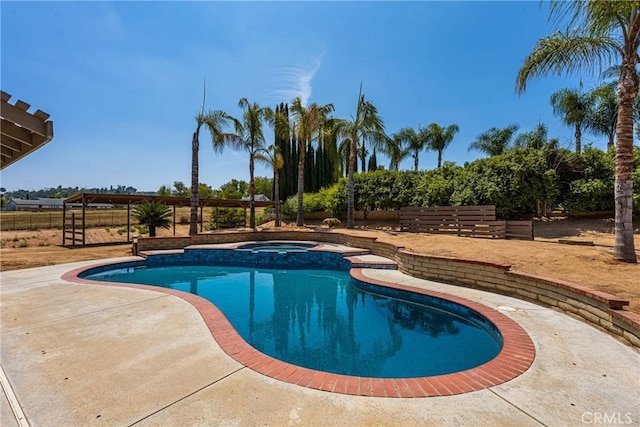 16481 Valle Vista Way, Riverside, CA 92506 - view of pool featuring a fenced backyard, a pool with connected hot tub, and a patio area