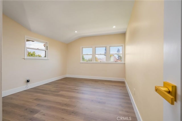 2445 Ocean View Dr, Upland, CA 91784 - unfurnished room featuring healthy amount of natural light, lofted ceiling, wood finished floors, baseboards, and recessed lighting