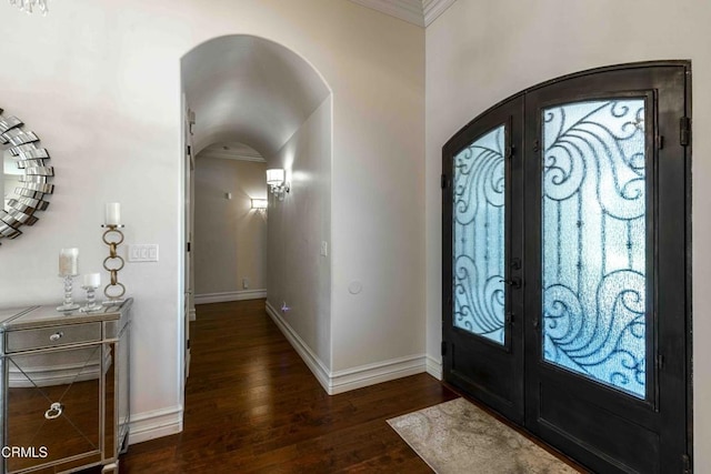 3007 Springbank Ct, Bakersfield, CA 93311 - entrance foyer with french doors, arched walkways, dark wood finished floors, baseboards, and crown molding