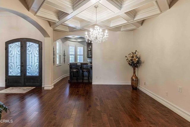 3007 Springbank Ct, Bakersfield, CA 93311 - entryway with arched walkways, a chandelier, beam ceiling, hardwood / wood-style flooring, and french doors