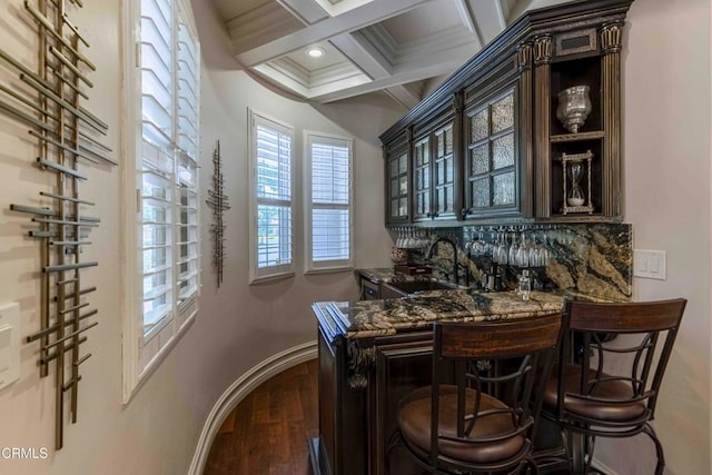 3007 Springbank Ct, Bakersfield, CA 93311 - indoor dry bar with beamed ceiling, dark wood-style flooring, and coffered ceiling