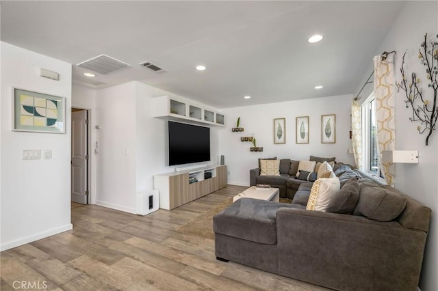 4852 W 129th St, Hawthorne, CA 90250 - living room featuring wood finished floors and recessed lighting