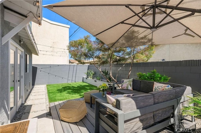 4852 W 129th St, Hawthorne, CA 90250 - wooden deck featuring an outdoor living space and a fenced backyard