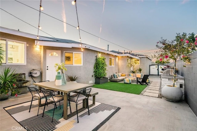 4852 W 129th St, Hawthorne, CA 90250 - fenced backyard featuring outdoor lounge area, a patio area, and outdoor dining area