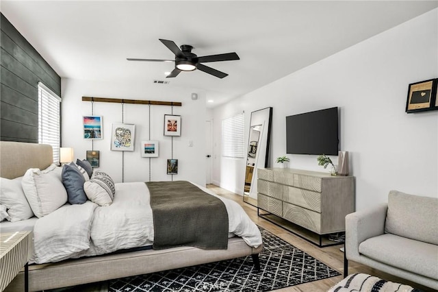 4852 W 129th St, Hawthorne, CA 90250 - bedroom featuring wood finished floors, multiple windows, and ceiling fan