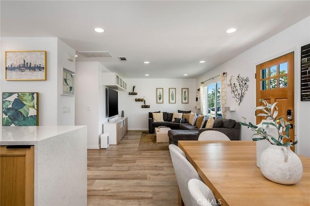4852 W 129th St, Hawthorne, CA 90250 - dining space with light wood finished floors and recessed lighting