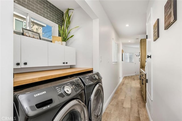 4852 W 129th St, Hawthorne, CA 90250 - laundry room with separate washer and dryer, cabinet space, light wood-type flooring, and recessed lighting
