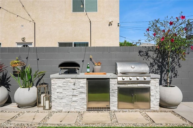 4852 W 129th St, Hawthorne, CA 90250 - view of patio with an outdoor kitchen