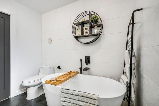 4852 W 129th St, Hawthorne, CA 90250 - bathroom featuring tile walls and a freestanding tub