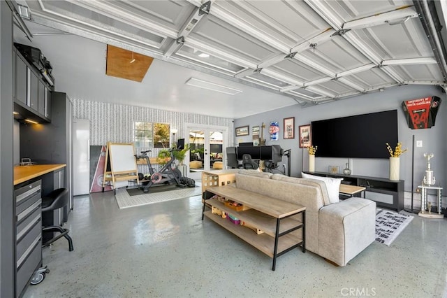 4852 W 129th St, Hawthorne, CA 90250 - living room with an office area, wallpapered walls, and speckle patterned floor
