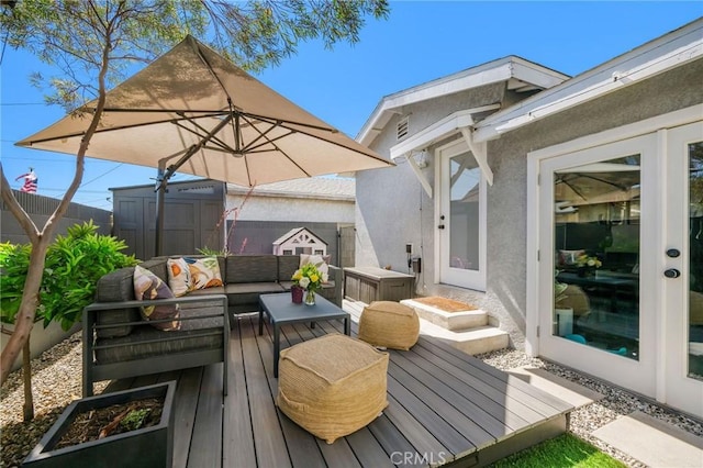 4852 W 129th St, Hawthorne, CA 90250 - deck featuring a shed, an outdoor hangout area, and a fenced backyard