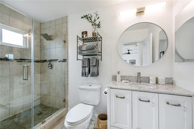 4852 W 129th St, Hawthorne, CA 90250 - full bathroom featuring vanity, a ceiling fan, and a shower stall
